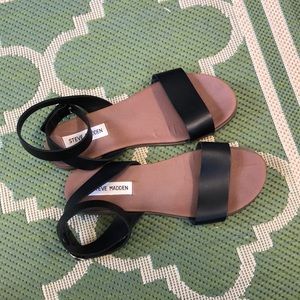 Steve Madden “Dalton” black leather sandals.